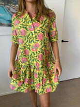 Load image into Gallery viewer, The Florence Drop Waist Dress in Illuminate print is a playful button-through mini dress with a drop waist, empire collar neckline and mid length tailored sleeves. 100% cotton. Block printed fabric. She&#39;s a bright ray of sunshine on a warm summers day. 
